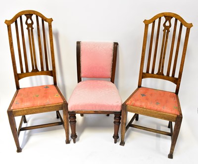 Lot 26 - A pair of elm Arts and Crafts dining chairs,...