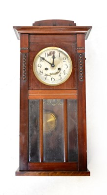 Lot 126 - An early 20th century walnut cased wall clock,...