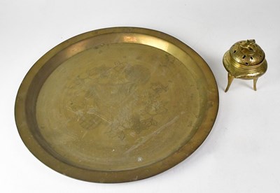 Lot 433 - An Eastern brass tray, possibly a table-top,...