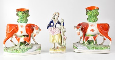 Lot 264 - A pair of Staffordshire flatback figure groups...