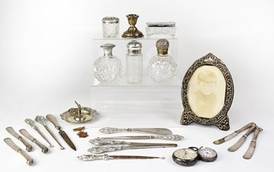 Lot 551 - A collection of hallmarked silver items to...