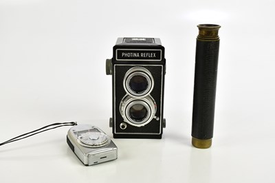 Lot 1184 - PHOTINA; a Reflex twin lens camera in case,...