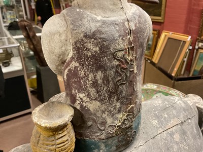 Lot 1014 - A 19th century painted wood sculpture of a boy...