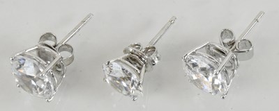 Lot 1304 - A pair of 18ct white gold white stone set...