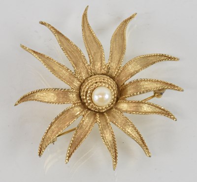 Lot 1369 - BOUCHER; a gold plated seed pearl effect set...