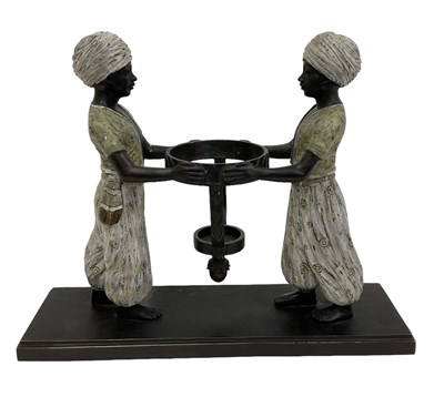 Lot 710 - A modern contemporary bronze candle holder...