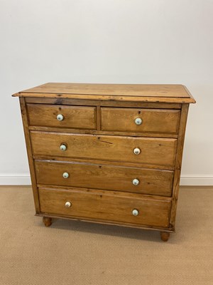 Lot 792 - A pine chest of two short over three graduated...