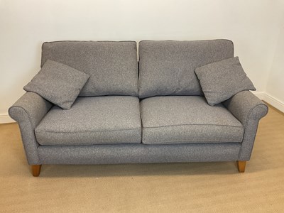 Lot 799 - A modern large two seat sofa, height at the...