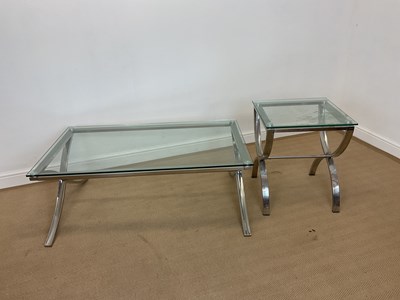 Lot 869 - A modern contemporary glass topped chrome...