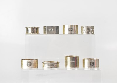 Lot 575 - Eight various hallmarked silver napkin rings,...