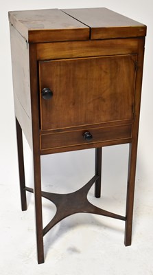 Lot 32 - An Edwardian walnut night stand with...