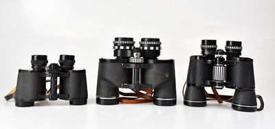 Lot 216 - Three pairs of cased binoculars comprising...