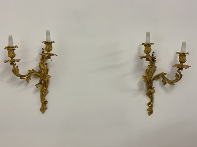 Lot 721 - A pair of French gilt brass Rococo style wall...