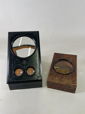 Lot 121 - A late 19th century ebonised stereoscope with...