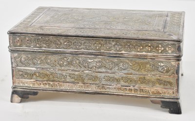 Lot 1167 - A Eastern white metal floral decorated...