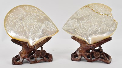 Lot 1046 - A pair of modern Chinese carved mother of...