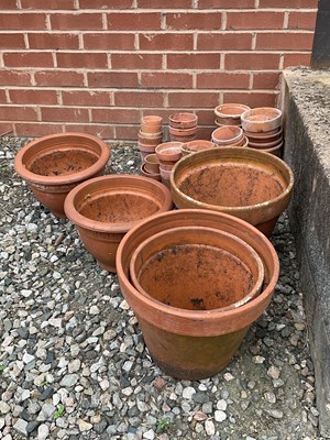 Lot 747 - A quantity of terracotta plant pots of various...