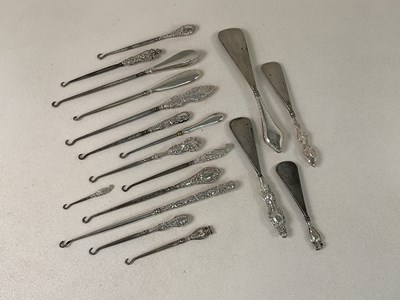 Lot 1493 - A group of eighteen hallmarked silver sheath...