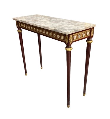 Lot 27 - A French reproduction mahogany and gilt metal...