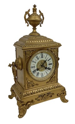 Lot 132 - A 19th century gilt metal mantel clock, the...