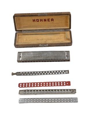 Lot 510 - HOHNER; a cased German 64 chromonica, with...