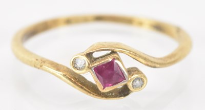 Lot 1275 - An 18ct yellow gold ruby set ring, size I/J,...