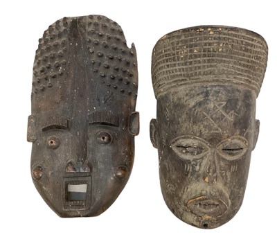 Lot 1104 - An African carved wooden Yela mask, 47 x 25cm,...