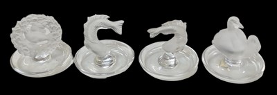 Lot 670 - LALIQUE; a pair of French frosted glass pin...