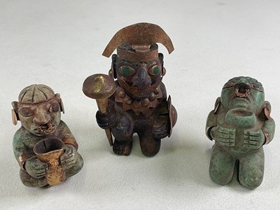 Lot 1033 - Three South American Inca inspired carved...