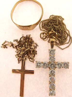 Lot 817 - Two 9ct gold crosses on necklace chains