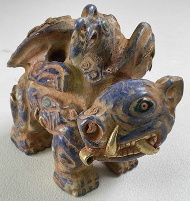 Lot 1006 - A South American Inca inspired carved blue...