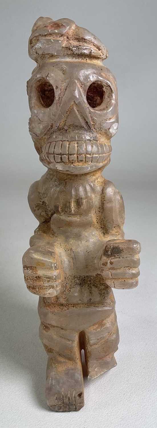 Lot 1049 - A South American Inca inspired carved