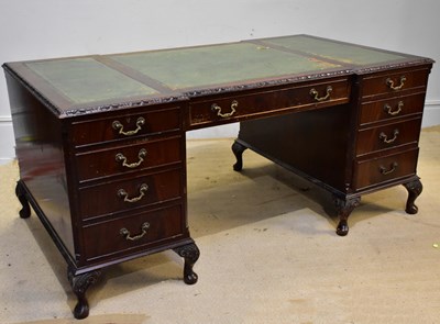 Lot 168 - A 20th century mahogany knee-hole desk with...