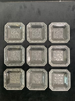 Lot 158 - LALIQUE; a set of nine clear and frosted glass...