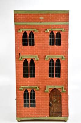 Lot 723 - A 20th century three storey doll's house with...