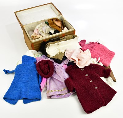 Lot 721 - A doll's trunk and contents, including dolls'...