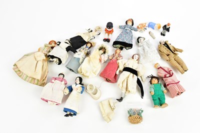 Lot 755 - A small collection of doll's house dolls.