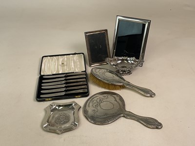 Lot 1455 - A group of silver and white metal items...