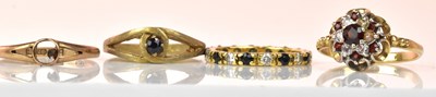 Lot 1061 - Three 9ct yellow gold dress rings including a...