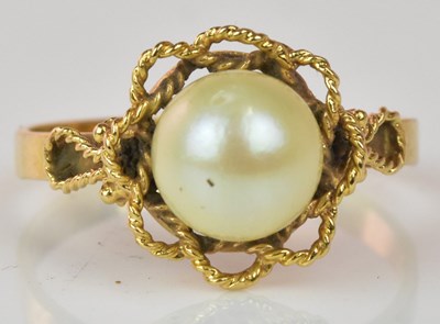 Lot 1068 - A yellow metal and cultured pearl dress ring,...