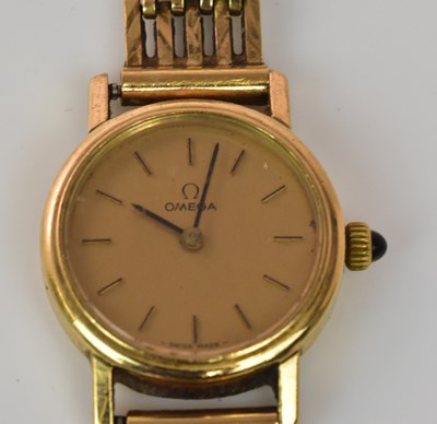 Lot 1330 - OMEGA; a lady's vintage 9ct yellow gold...