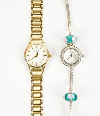 Lot 596 - ACCURIST; two boxed lady's quartz wristwatches.