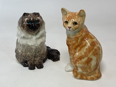 Lot 205 - WINSTANLEY POTTERY; two cats in seated...