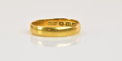 Lot 1224 - A 22ct yellow gold wedding band, size L 1/2,...