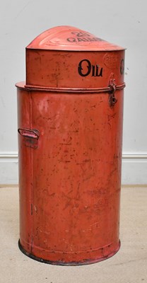 Lot 252 - A red painted twenty gallon oil cabinet,...