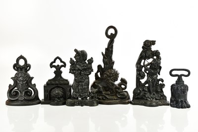 Lot 520 - Six Victorian and later doorstops, including...