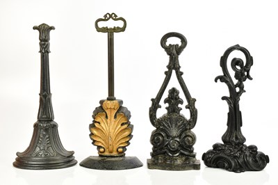 Lot 540 - Four Victorian and later cast iron doorstops...