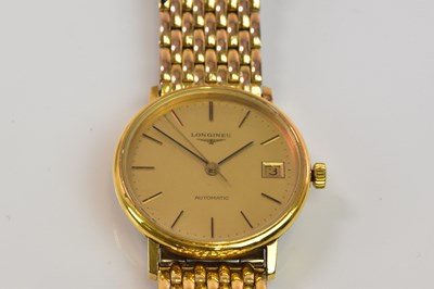 Lot 1325 - LONGINES; a gentleman's automatic gold plated...