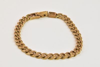 Lot 1207 - A 9ct yellow gold curb link bracelet, length...