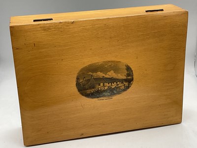 Lot 27 - MAUCHLINE WARE; a large sewing box, the lid...